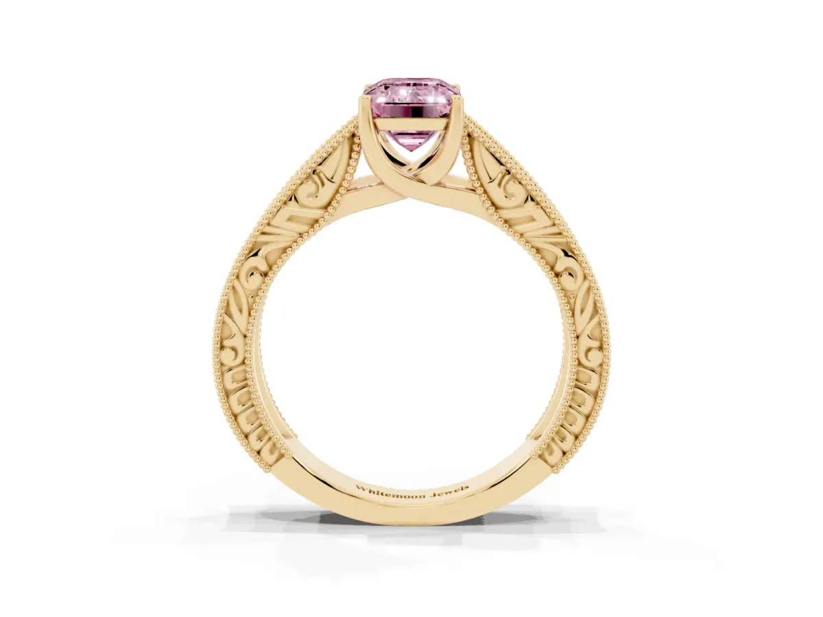 Fancy Pink Emerald Cut Diamond Solitaire Ring with Engraved Band and Four-Prong Setting Yellow gold