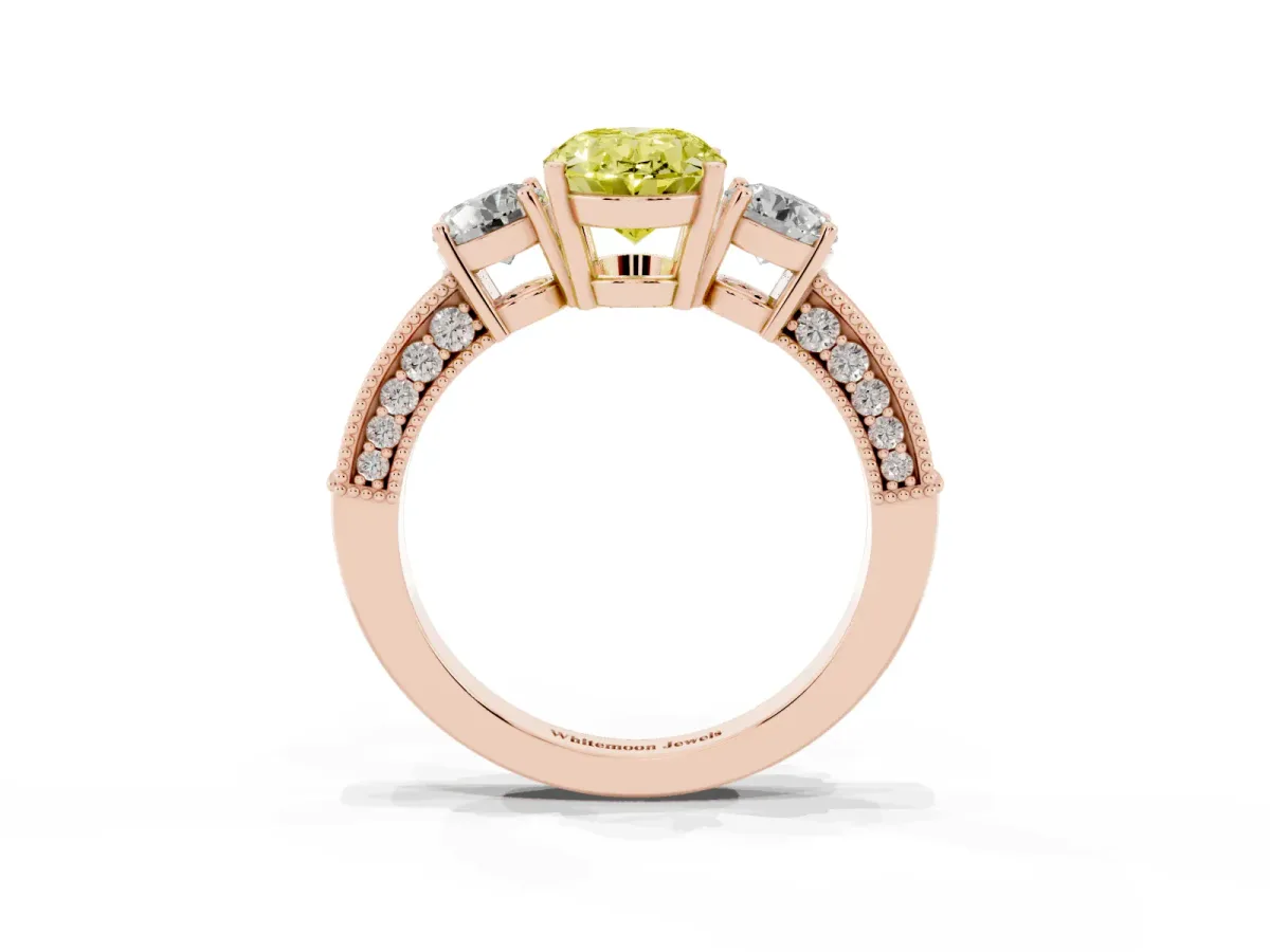 Fancy Yellow Oval Cut Three-Stone Diamond Ring with Pavé Band and Four-Prong Setting Rose gold