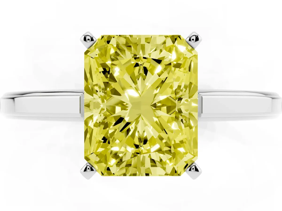 Fancy Yellow Radiant Cut Solitaire Diamond Ring with Four-Prong Setting and Classic Band Silver