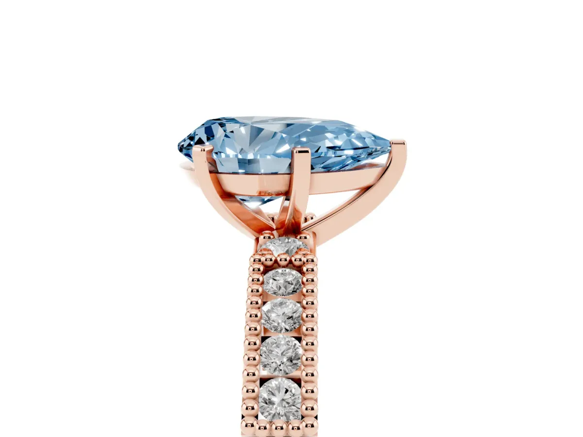 Fancy Blue Pear Cut Solitaire with Pavé Band and Four-Prong Setting Rose gold
