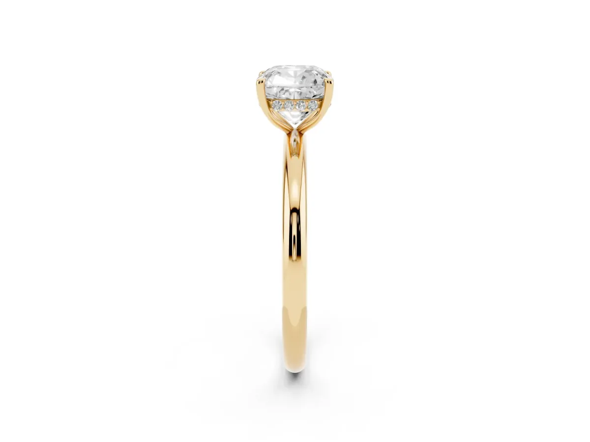 Cushion Cut Diamond Solitaire Ring with Thin Band and Four-Prong Setting Yellow gold