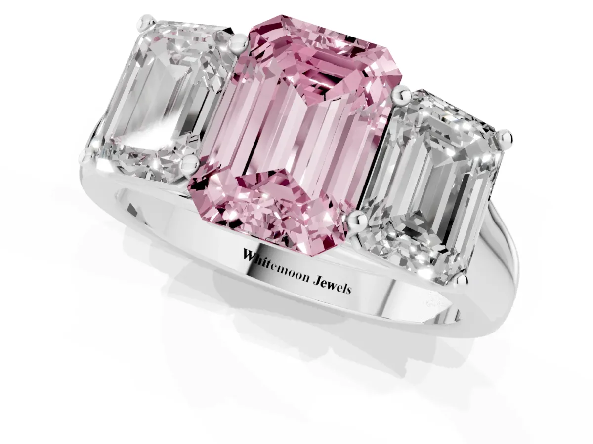 Fancy Pink Emerald Cut Three-Stone Diamond Ring with Prong Setting on a Classic Band Silver