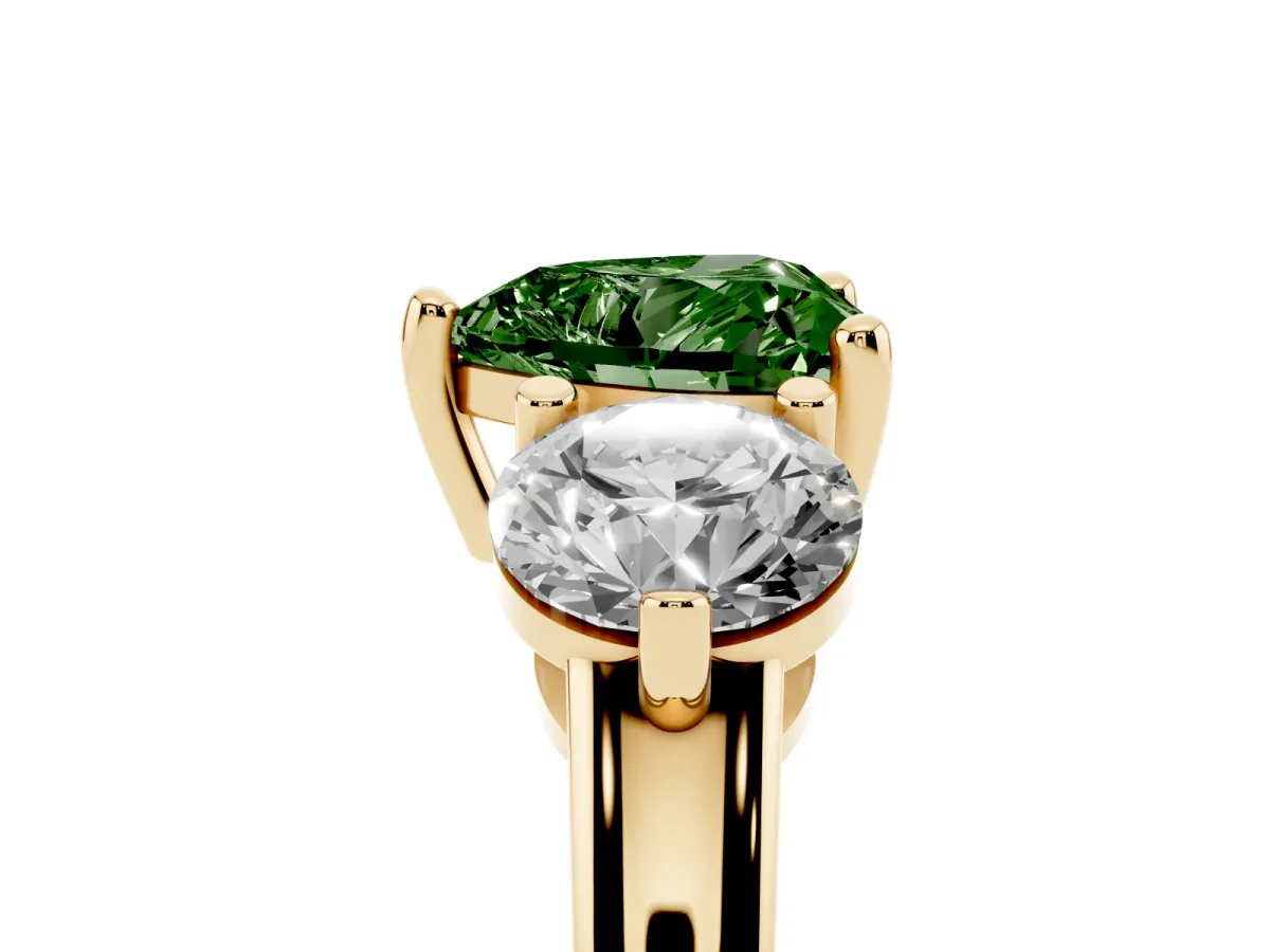 Fancy Green Three-Stone Heart Cut Brilliant Cut Solitaire Ring with Prong Setting on a Classic Band Yellow gold