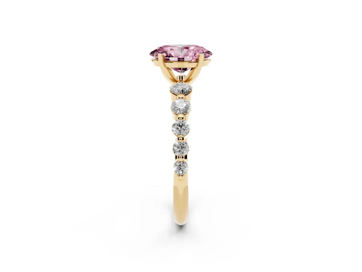 Fancy Pink Oval Cut Solitaire Diamond Ring with Pave Band and Four-Prong Setting Yellow gold
