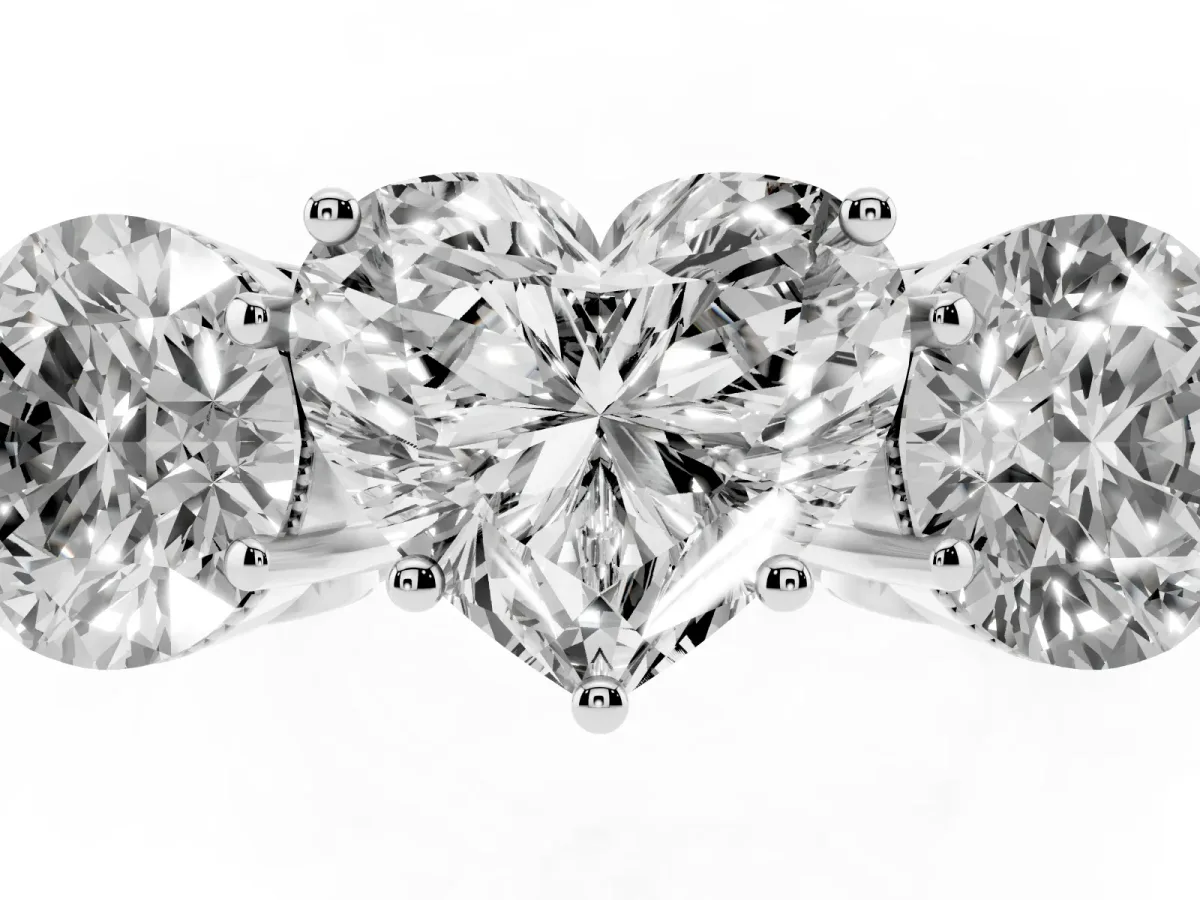 Three-Stone Heart Cut Diamond Engagement Ring with Prong Setting on a Classic Band Silver