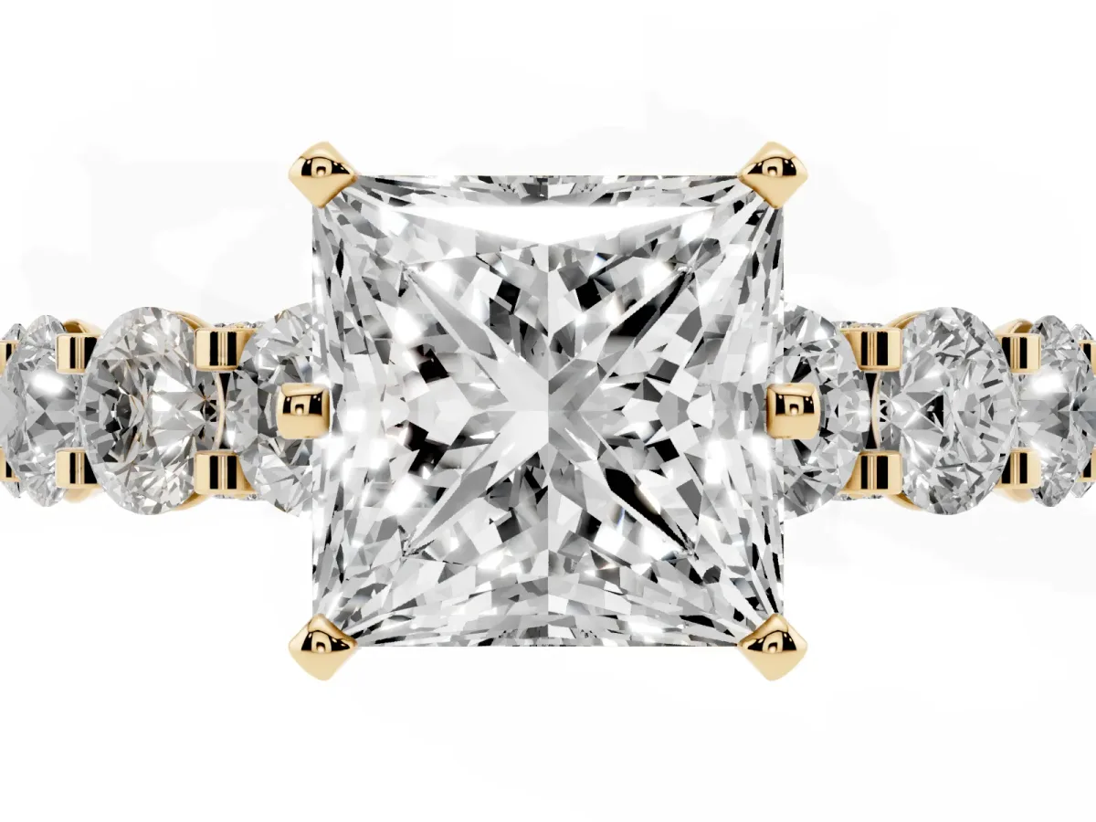 Princess Cut Diamond Side Stone Engagement Ring with Four-Prong Setting Yellow gold