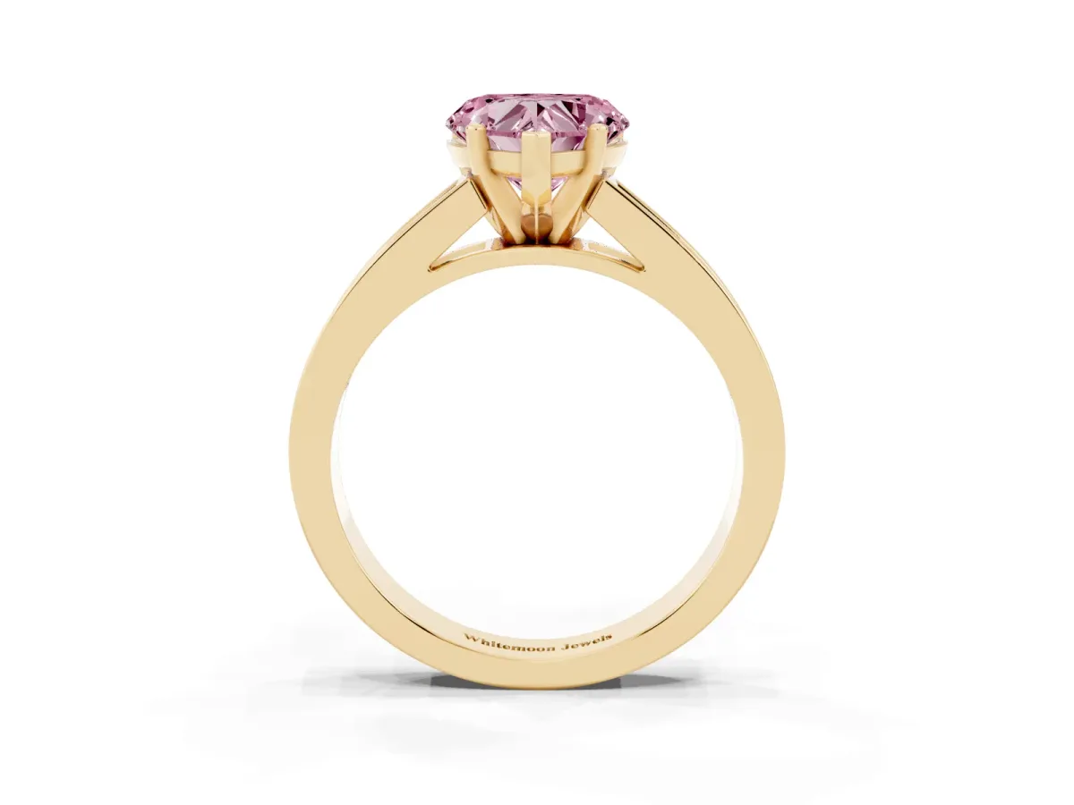 Fancy Pink Heart Cut Solitaire Diamond Ring with Channel-Set Band and Four-Prong Setting Yellow gold