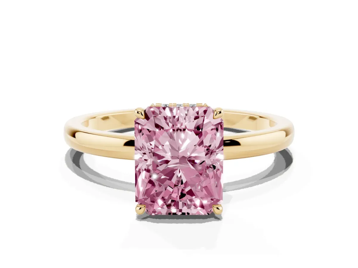 Fancy Pink Radiant Cut Solitaire Engagement Ring with Cathedral Band and Four-Prong Setting Yellow gold