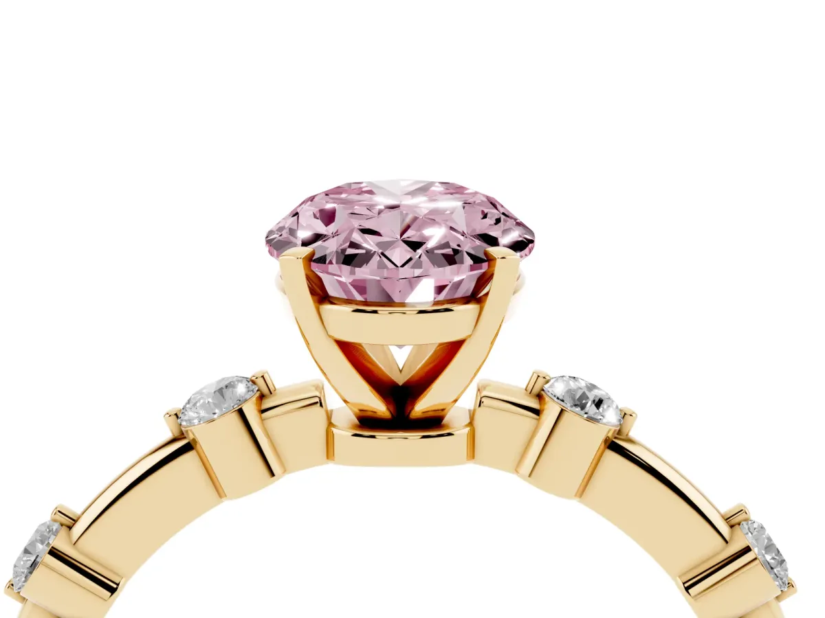 Fancy Pink Oval Cut Solitaire Diamond Ring with Bezel Set Side Stones and Prong Setting Yellow gold