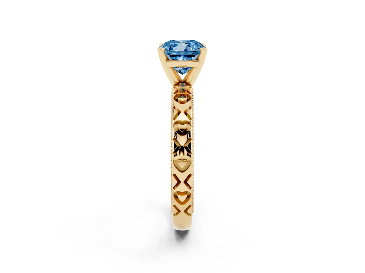 Fancy Blue Cushion Cut Solitaire Diamond Engagement Ring with XO Engraved Band and Four-Prong Setting Yellow gold