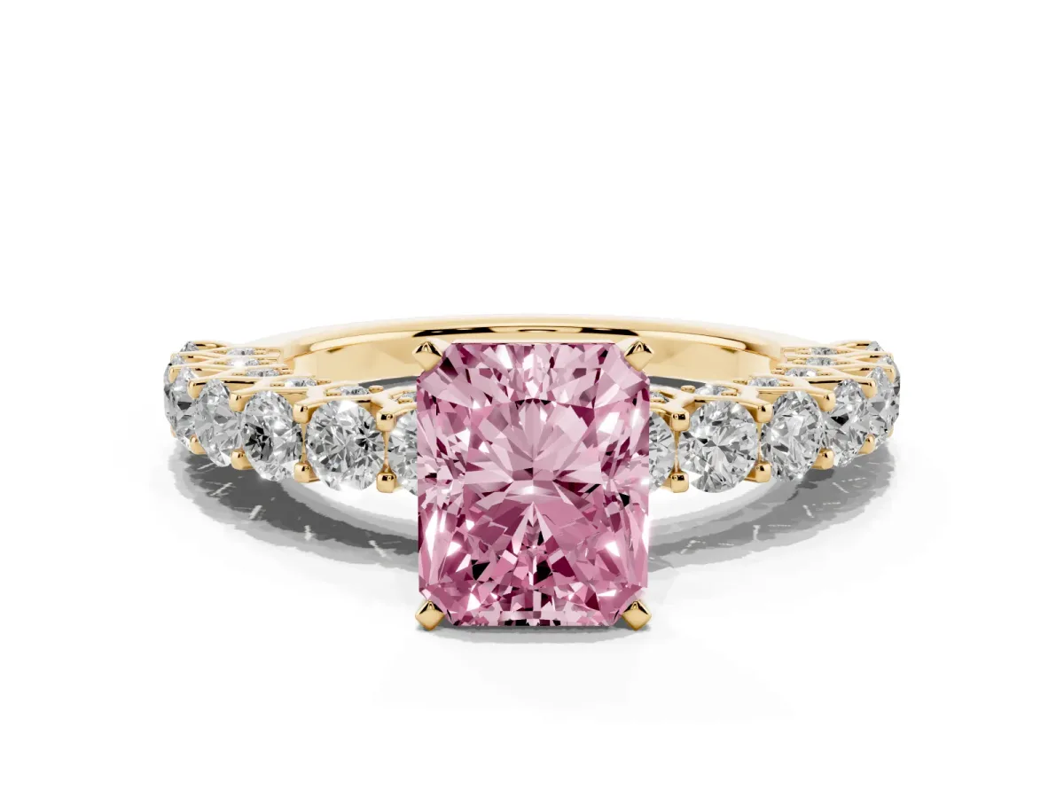 Fancy Pink Radiant Cut Diamond Solitaire Ring with Shared Prong Pavé Band and Four-Prong Setting Yellow gold