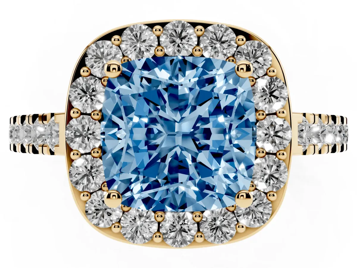 Fancy Blue Cushion Cut Diamond Halo Ring with Round Pavé Split Shank and Prong Setting Yellow gold