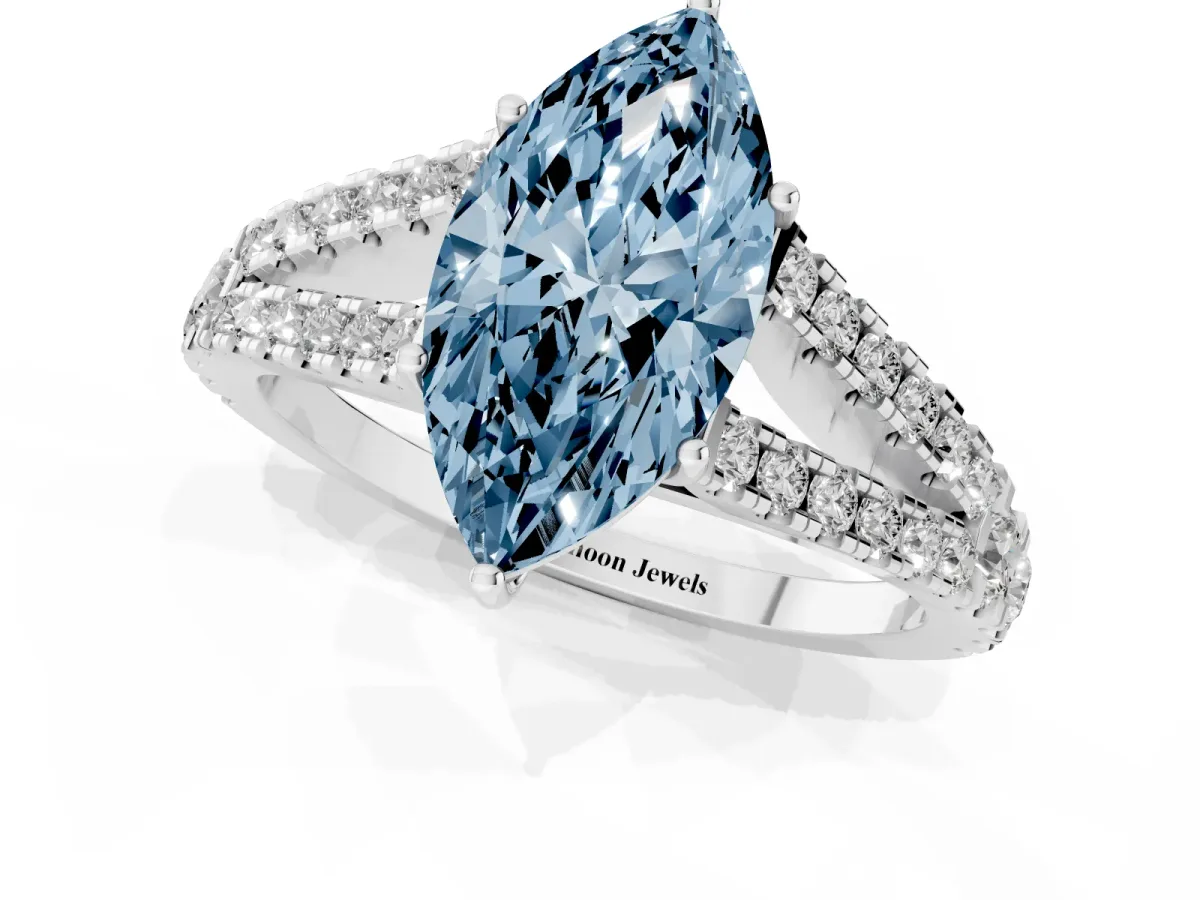 Fancy Blue Marquise Cut Diamond Split Shank Engagement Ring with Round Pavé and Prong Setting Silver