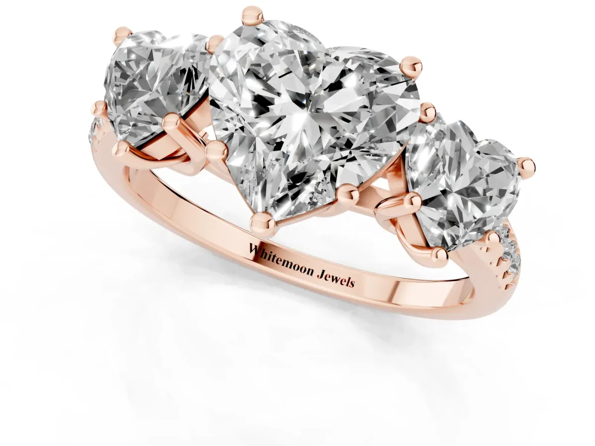 Three-Stone Heart Cut Diamond Ring with Round Pavé Band and Prong Setting Rose gold