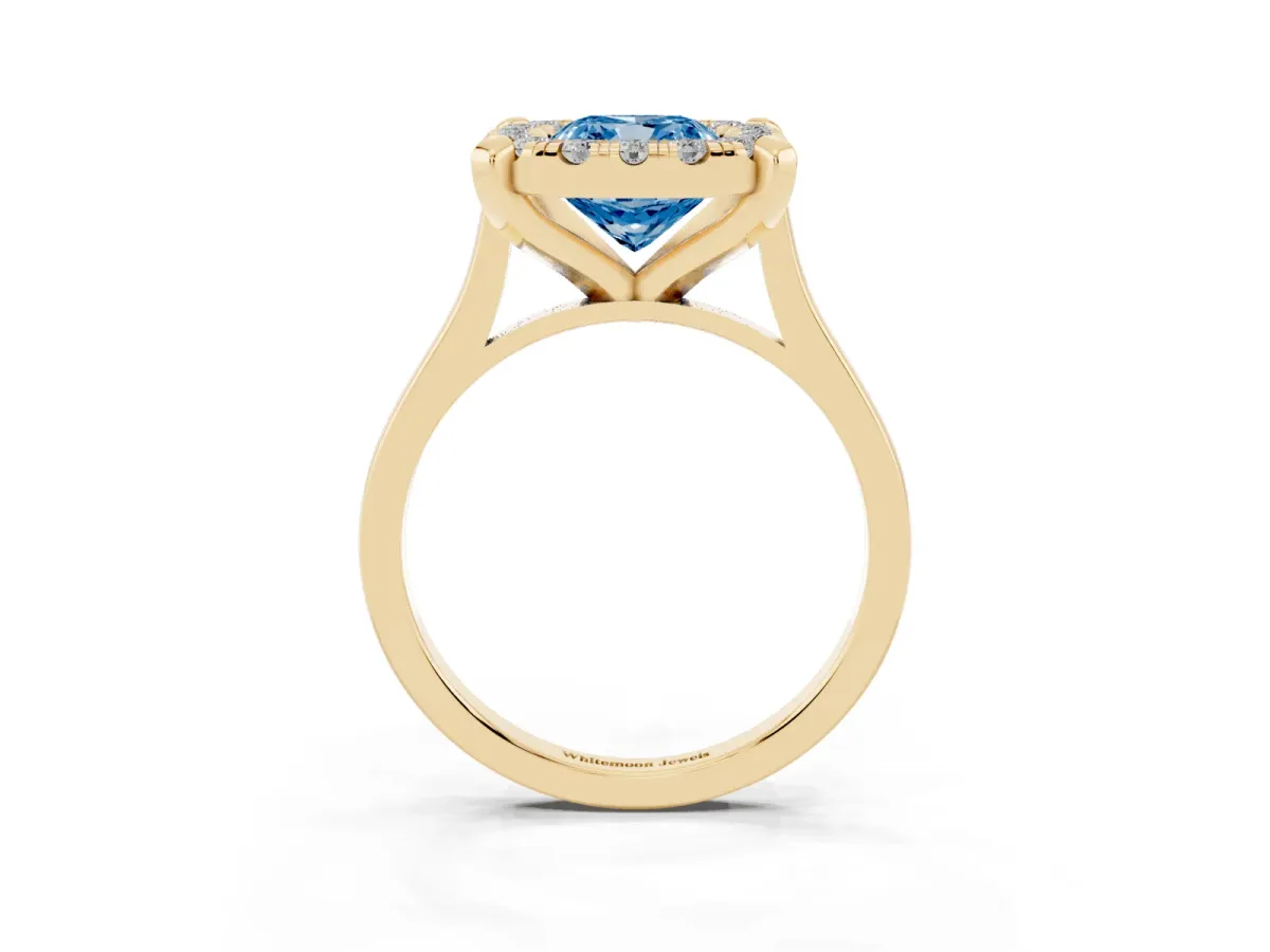 Fancy Blue Cushion Cut Diamond Cluster Halo Solitaire with Four-Prong Setting Yellow gold