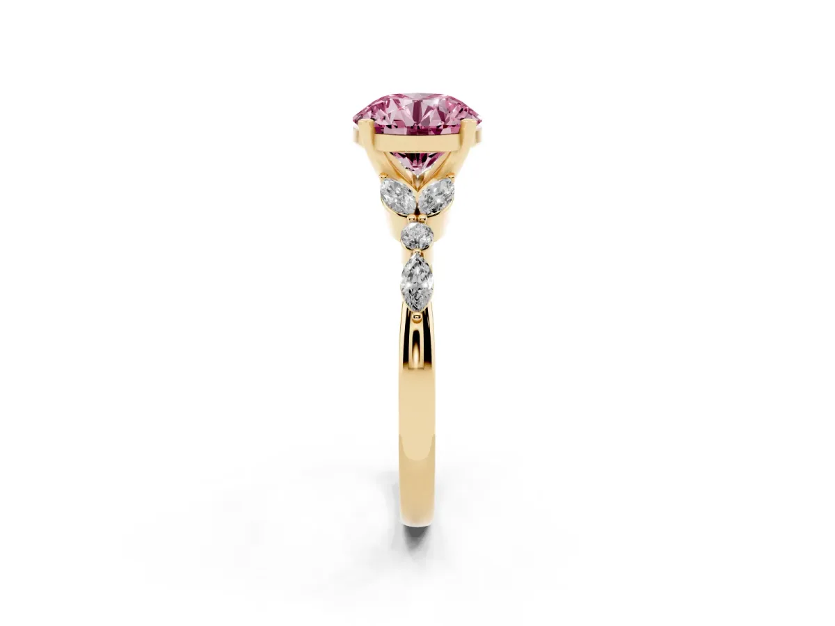 Fancy Pink Round Cut Diamond Solitaire Ring with Side Stones and Four-Prong Setting Yellow gold