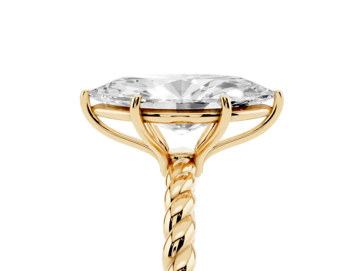 Marquise Cut Solitaire Twist Band Ring with Four-Prong Setting Yellow gold