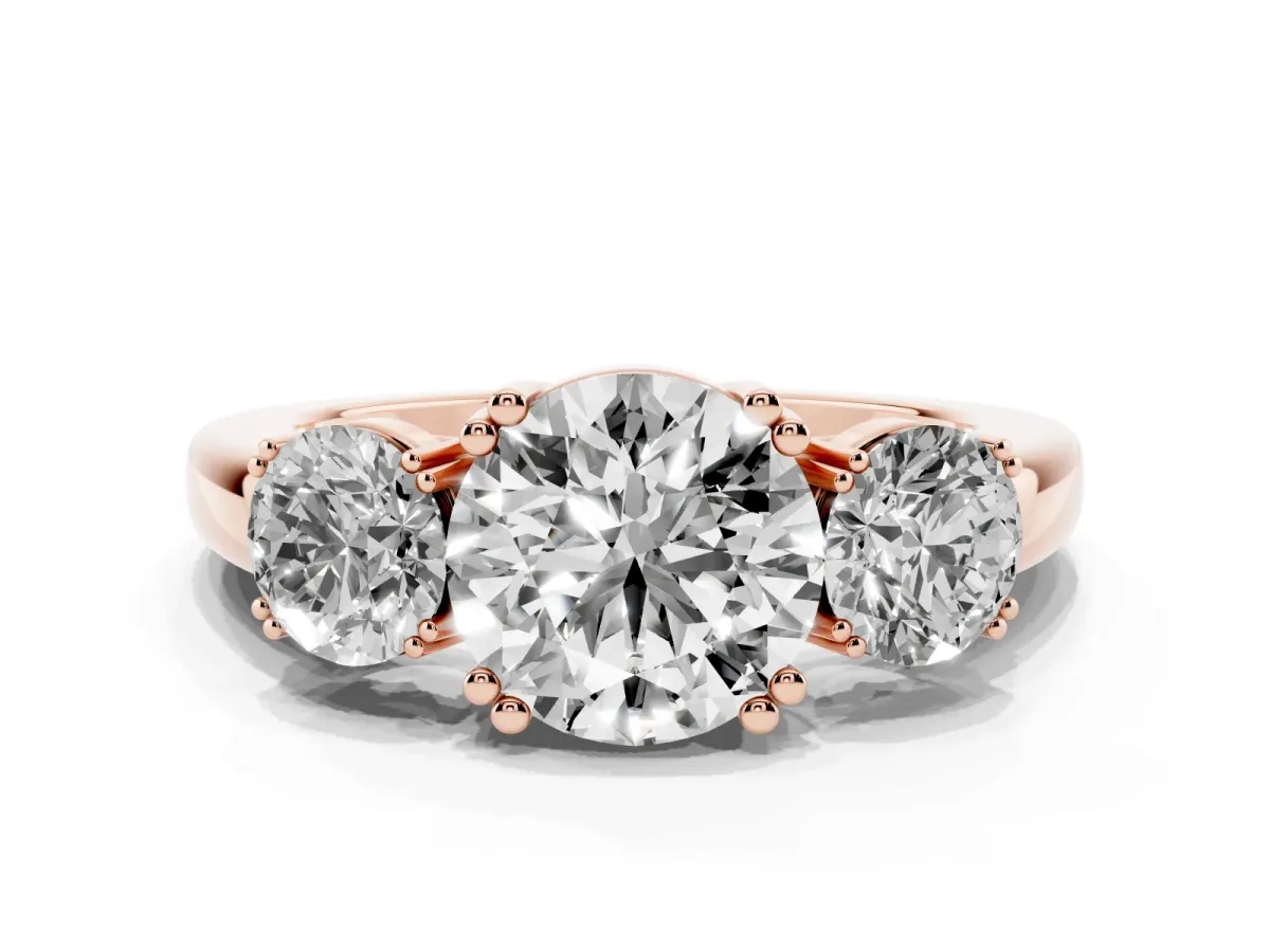 Three-Stone Round Cut Cut Diamond Ring with Channel Set Band and Four-Prong Setting Rose gold