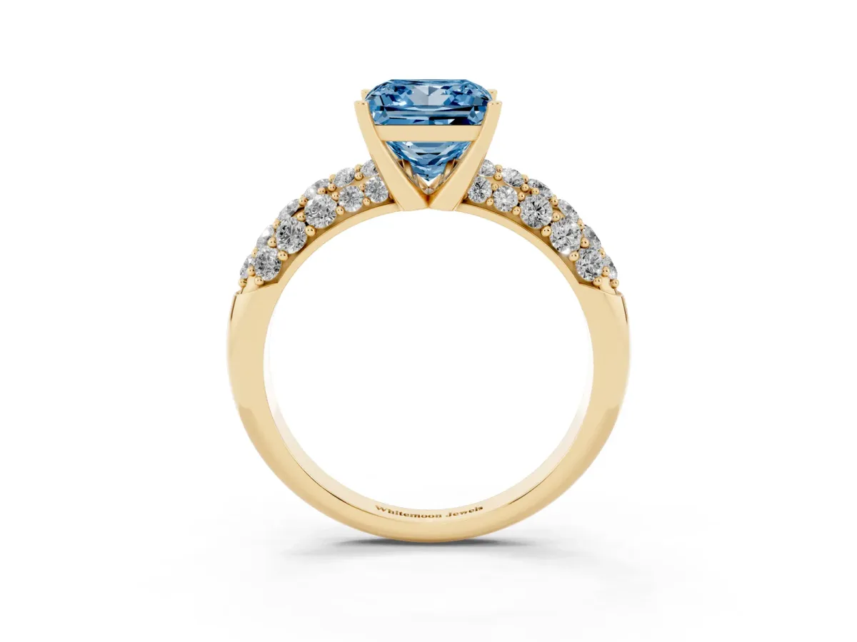 Fancy Blue Princess Cut Diamond Pavé Band Solitaire Ring with Four-Prong Setting Yellow gold
