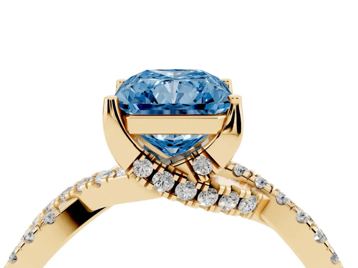 Fancy Blue Radiant Cut Solitaire Twist Pave Diamond Engagement Ring with Prong Setting Yellow gold