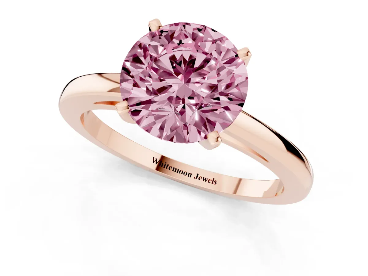 Fancy Pink Round Cut Solitaire Diamond Engagement Ring with Four-Prong Setting on a Classic Band Rose gold