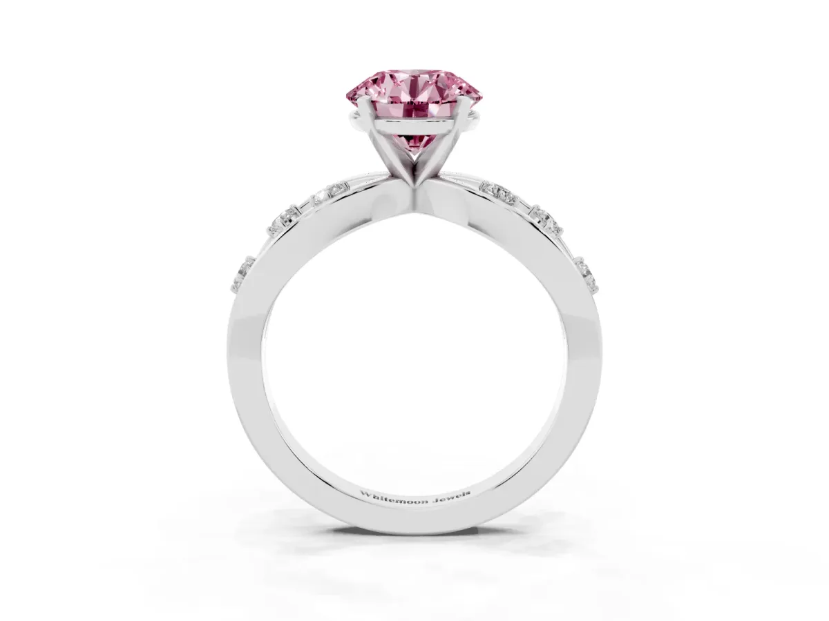 Fancy Pink Round Cut Cut Solitaire Diamond with Side Stones on Criss-Cross Band and Four-Prong Setting White gold