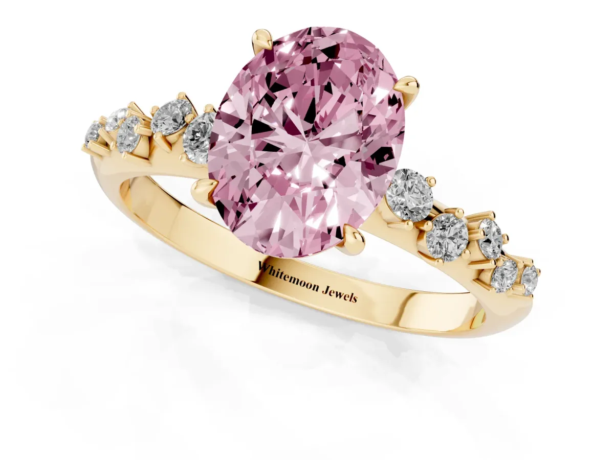 Fancy Pink Oval Cut Diamond Cluster Side Stone Solitaire Ring with Prong Setting Yellow gold