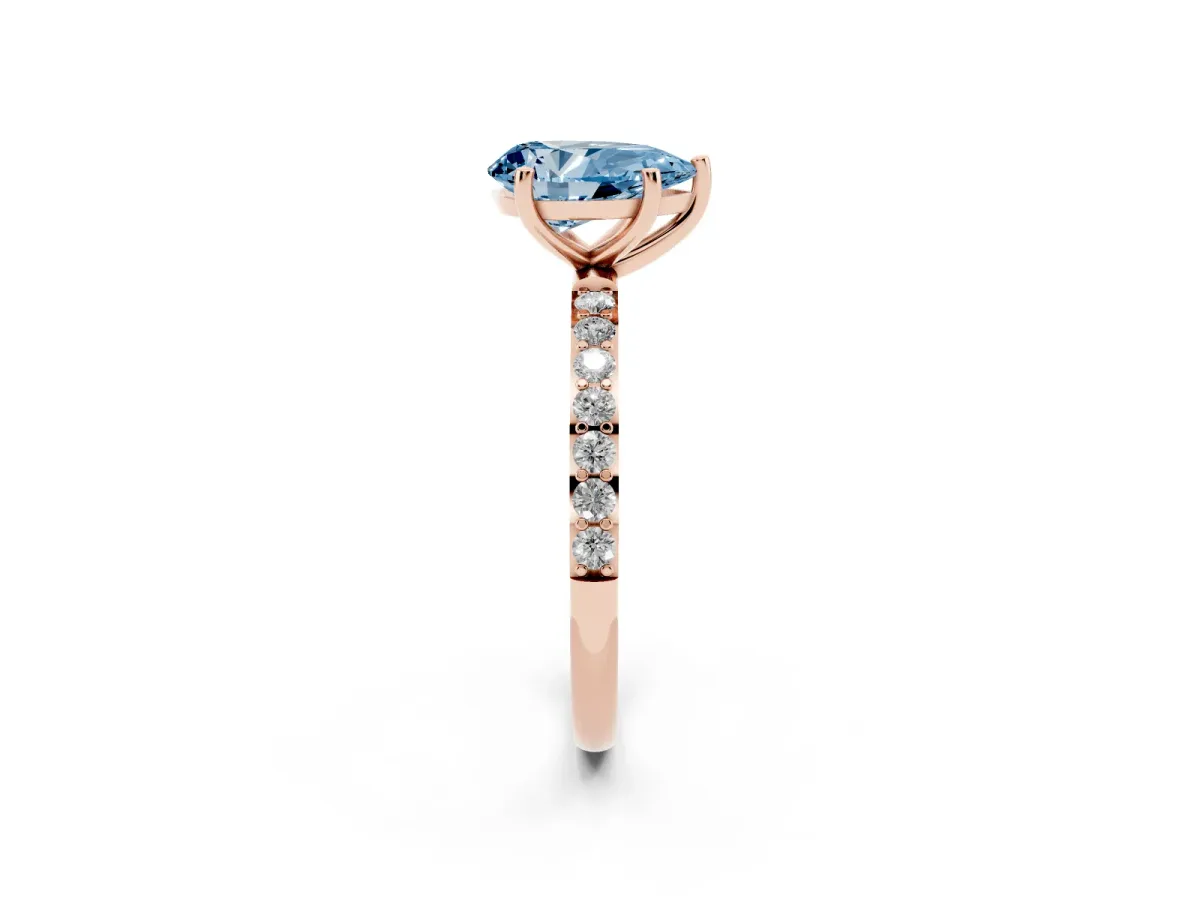 Fancy Blue Pear Cut Diamond Solitaire Ring with Round Pavé Shoulders and Prong Setting Rose gold