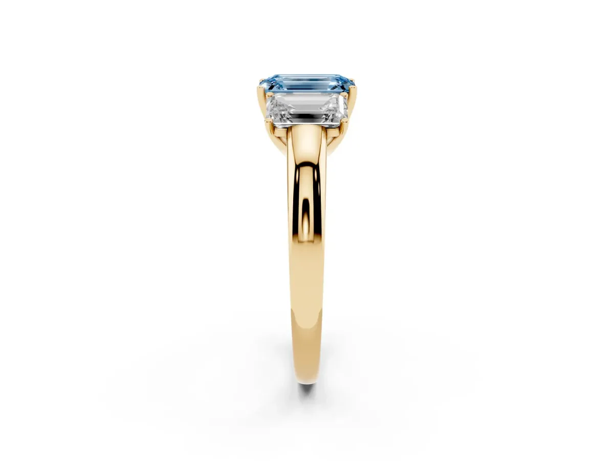 Fancy Blue Emerald Cut Diamond Three-Stone Ring with Four-Prong Setting and Classic Band Yellow gold