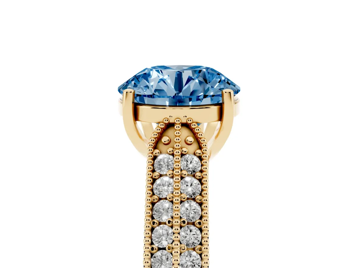 Fancy Blue Round Cut Cut Pave Split Shank Engagement Ring with Four-Prong Setting Yellow gold