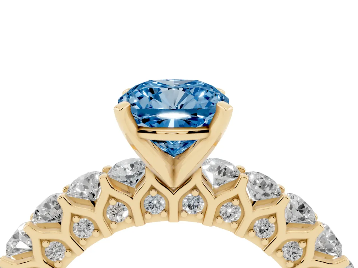 Fancy Blue Cushion Cut Diamond Solitaire Ring with Shared Prong Pavé Band and Four-Prong Setting Yellow gold