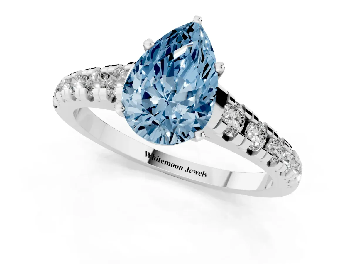 Fancy Blue Pear Cut Diamond Cathedral Solitaire Ring with Round Pavé Band Silver