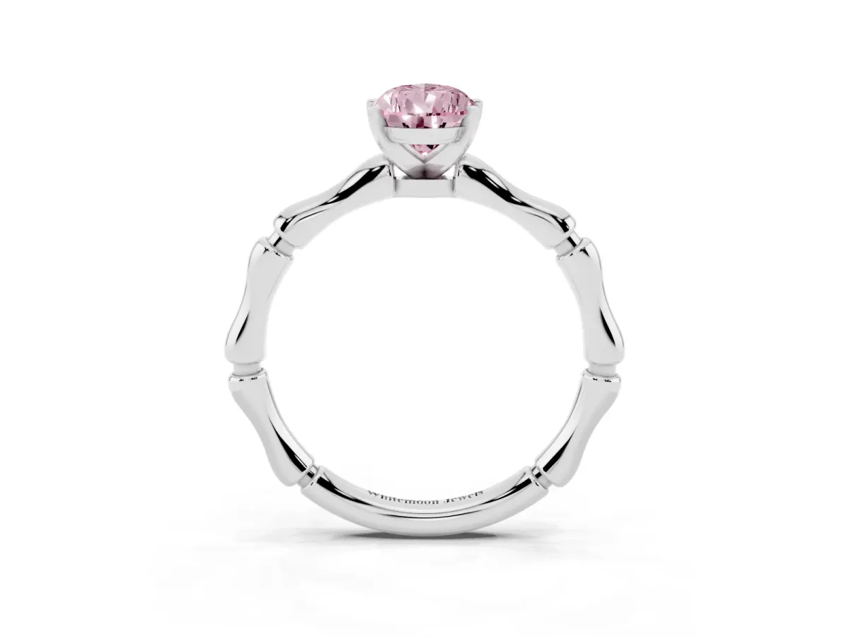 Fancy Pink Pear Cut Solitaire Diamond Ring with Bamboo Band and Four-Prong Setting Platinum