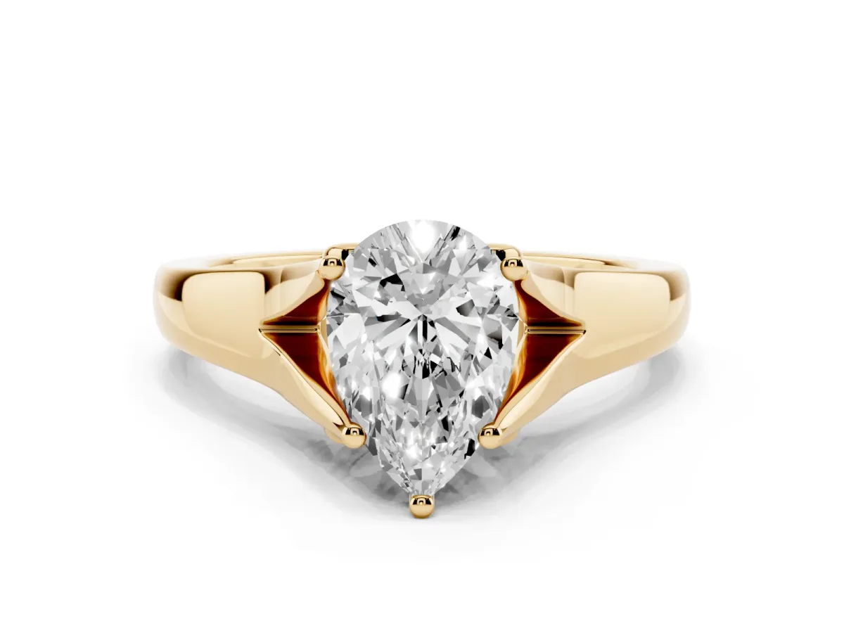 Pear Cut Solitaire Diamond Ring with Cathedral Band and Four-Prong Setting Yellow gold