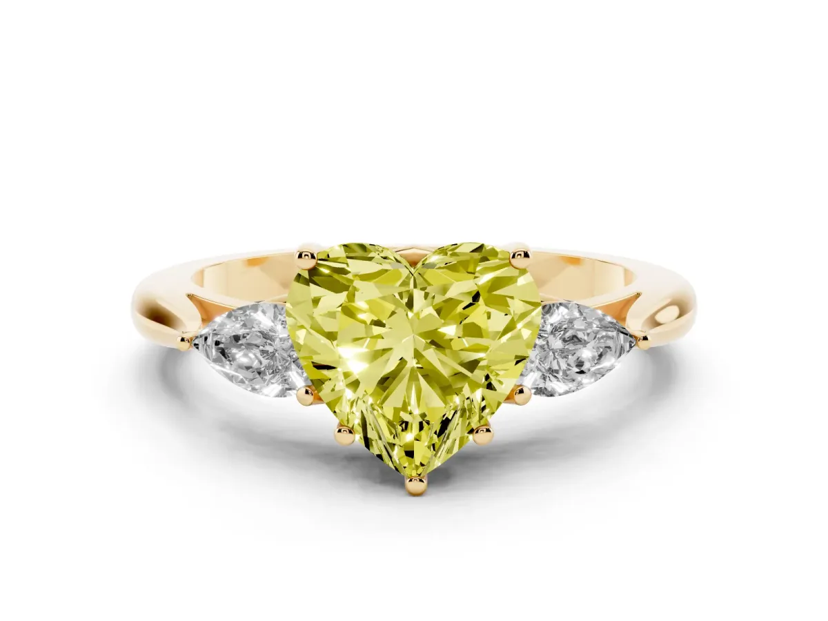 Fancy Yellow Three-Stone Heart Cut Brilliant Diamond Solitaire Ring with Tapered Band and Four-Prong Setting Yellow gold