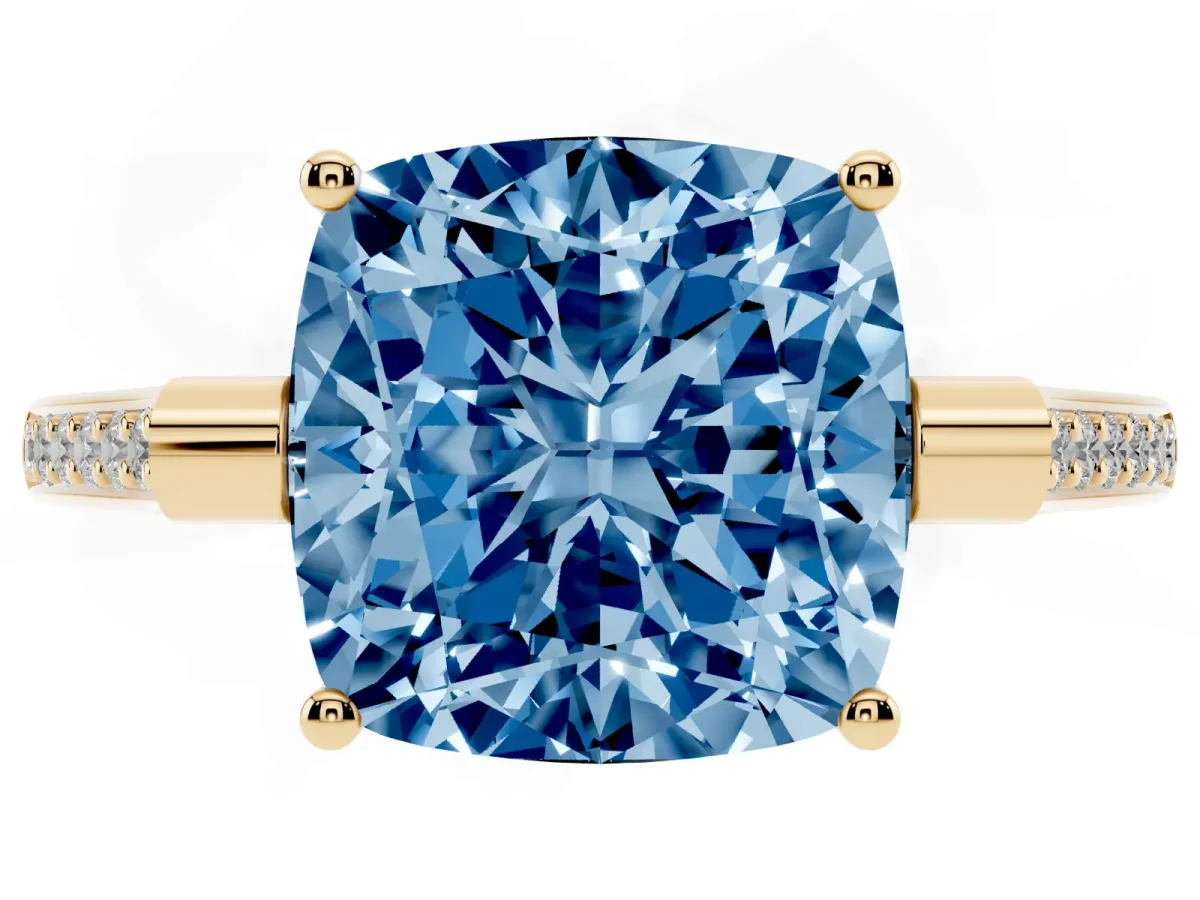 Fancy Blue Cushion Cut Solitaire Diamond Ring with Channel Set Band and Bezel Prong Setting Yellow gold
