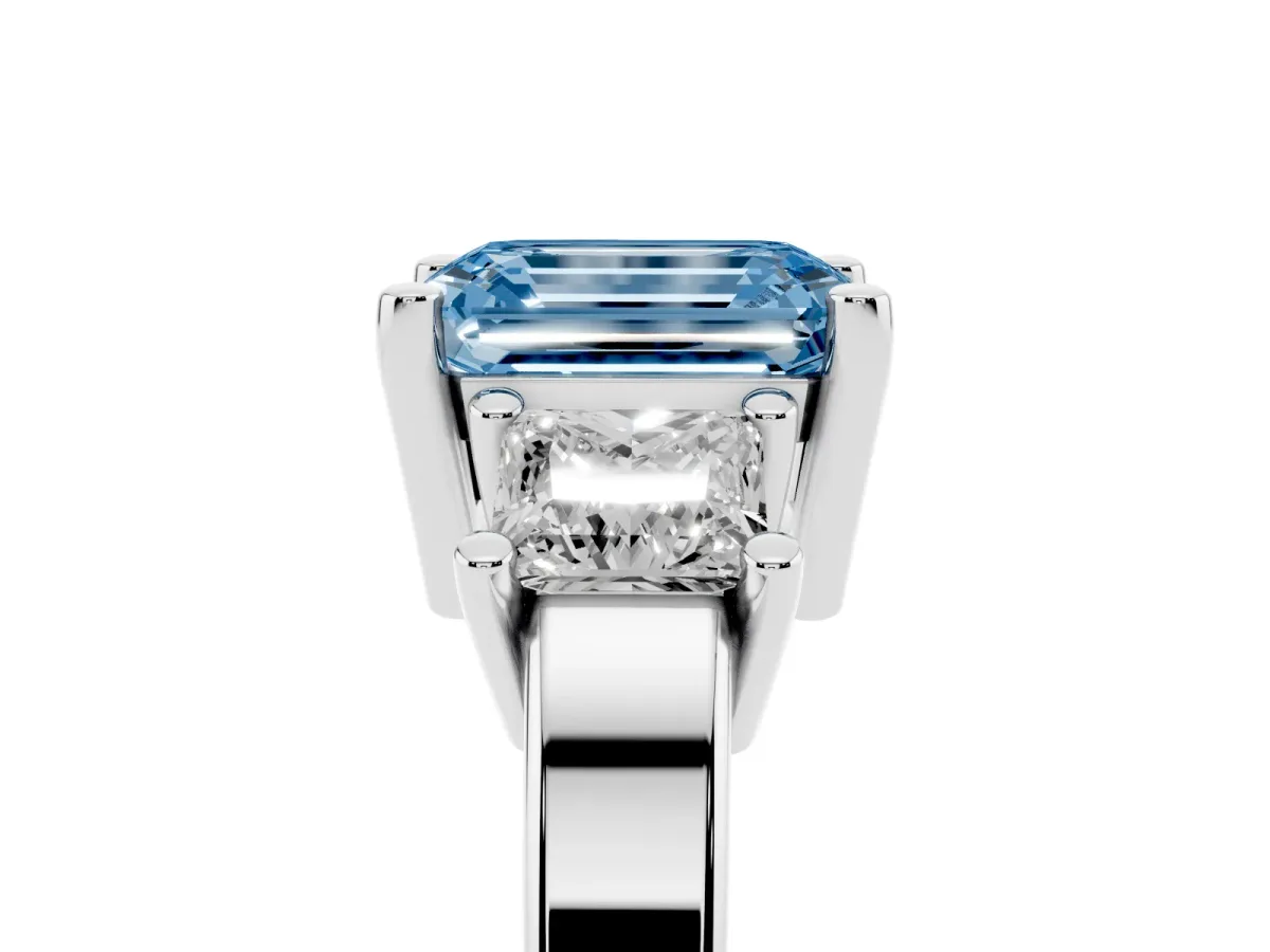 Fancy Blue Three-Stone Emerald Cut Cut Solitaire Ring with Prong Setting Silver
