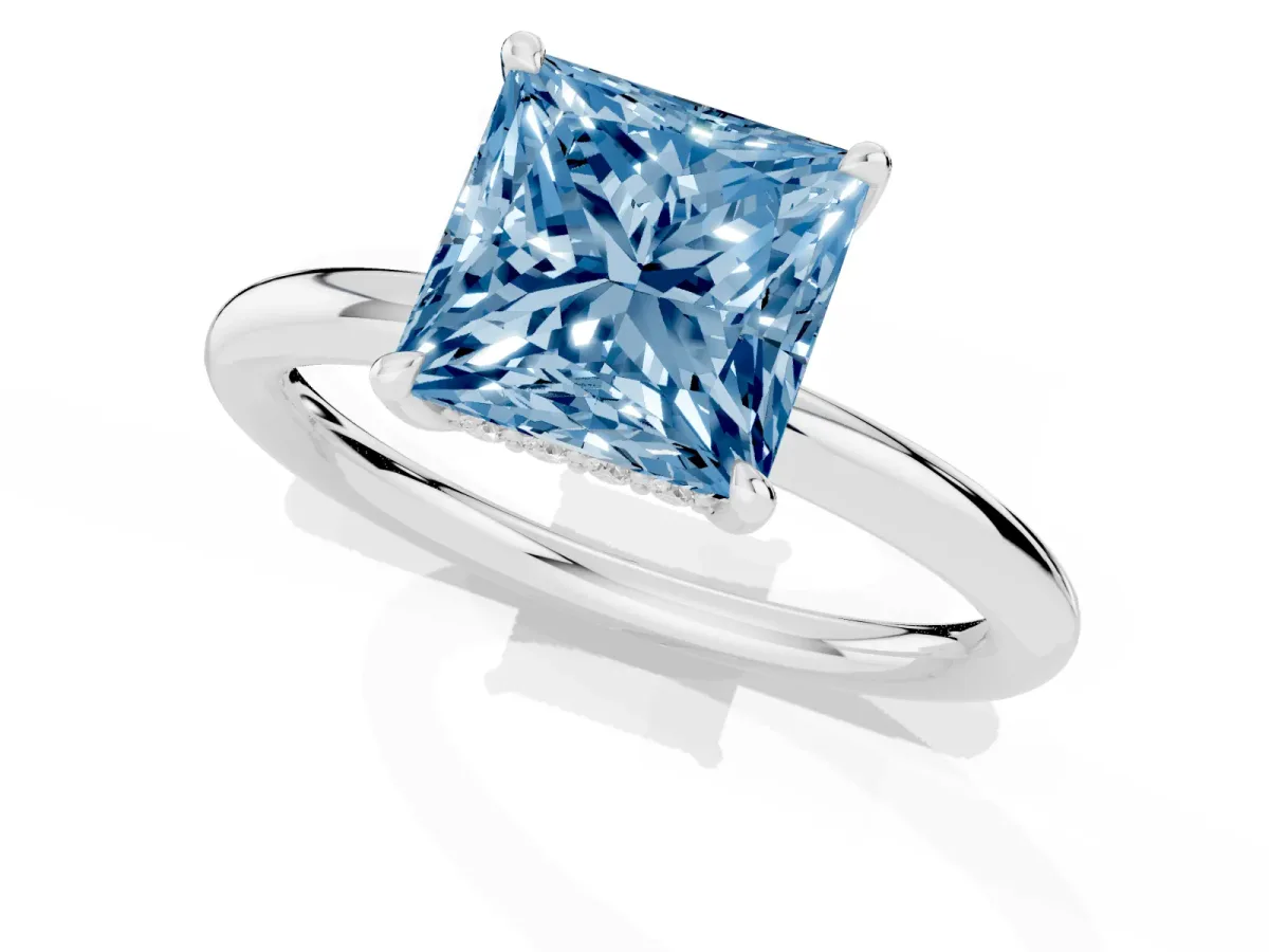 Fancy Blue Princess Cut Diamond Solitaire Ring with Thin Band and Four-Prong Setting Platinum