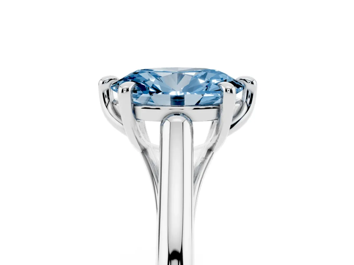 Fancy Blue Oval Cut Solitaire Engagement Ring with Six-Prong Setting and Classic Band Silver