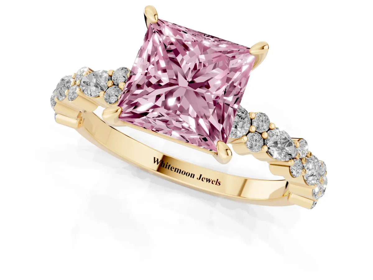 Fancy Pink Princess Cut Diamond Side Stone Solitaire Ring with Round and Four-Prong Setting Yellow gold