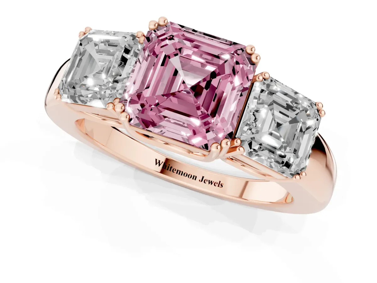 Fancy Pink Three-Stone Asscher Cut Cut Diamond Ring with Channel Set Band and Four-Prong Setting Rose gold
