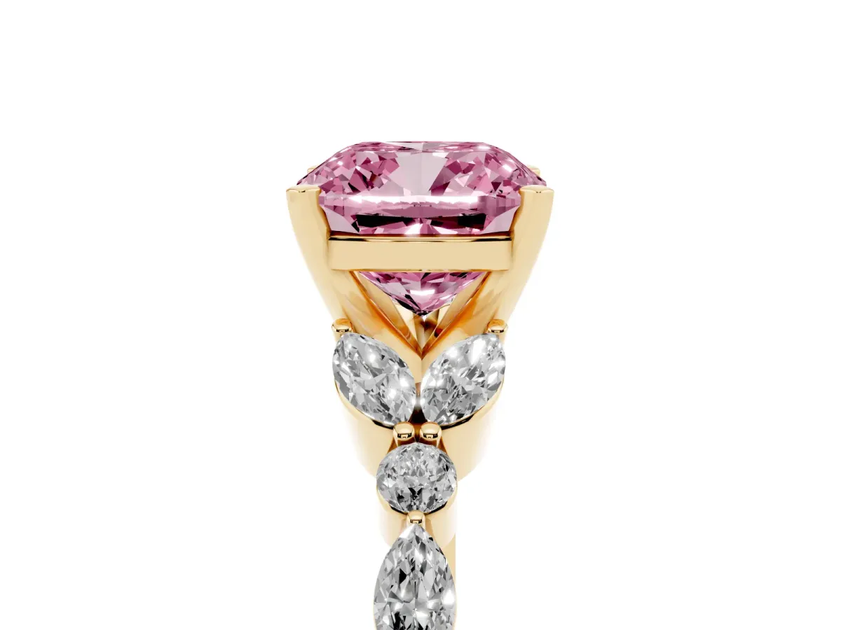 Fancy Pink Cushion Cut Diamond Solitaire Ring with Side Stones and Four-Prong Setting Yellow gold