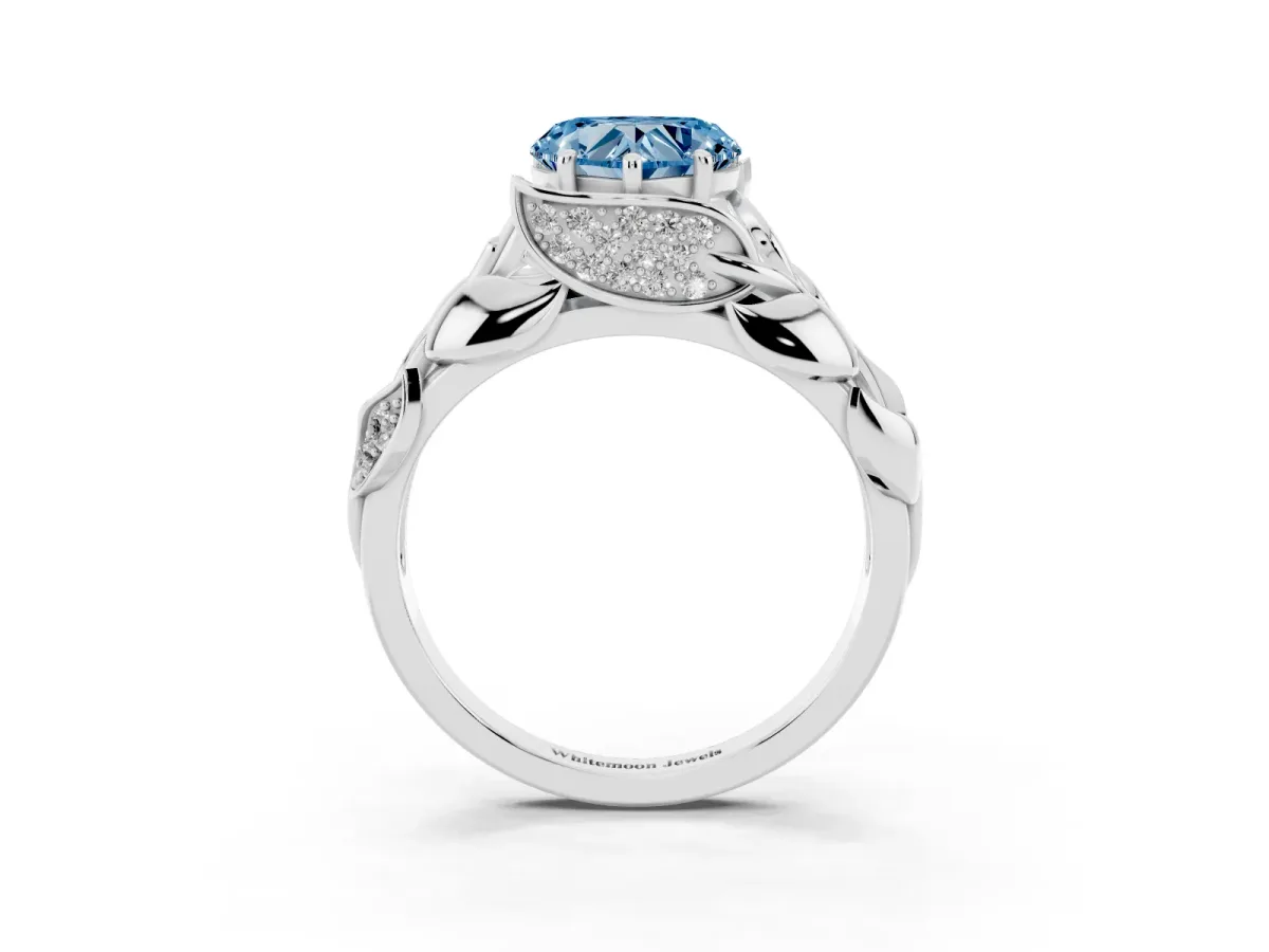 Fancy Blue Heart Cut Diamond Leaf-Inspired Engagement Ring with Round Accents and Prong Setting White gold