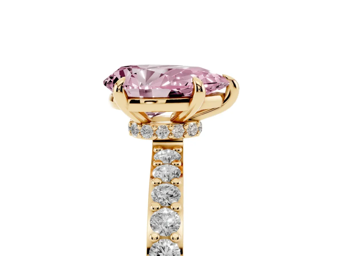 Fancy Pink Pear Cut Diamond Pavé Engagement Ring with Round Accents and Prong Setting Yellow gold