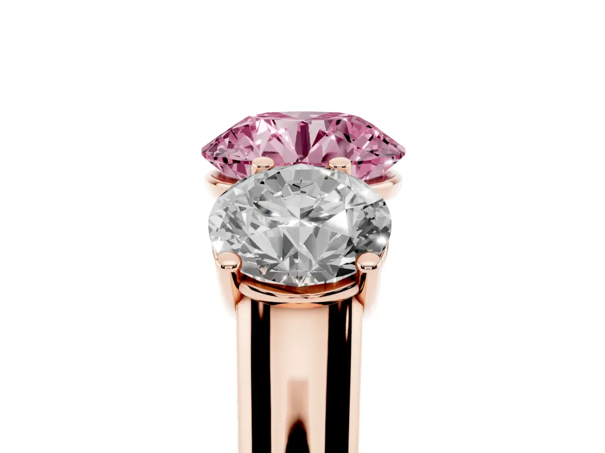 Fancy Pink Round Cut Three-Stone Diamond Ring with Prong Setting on a Classic Band Rose gold
