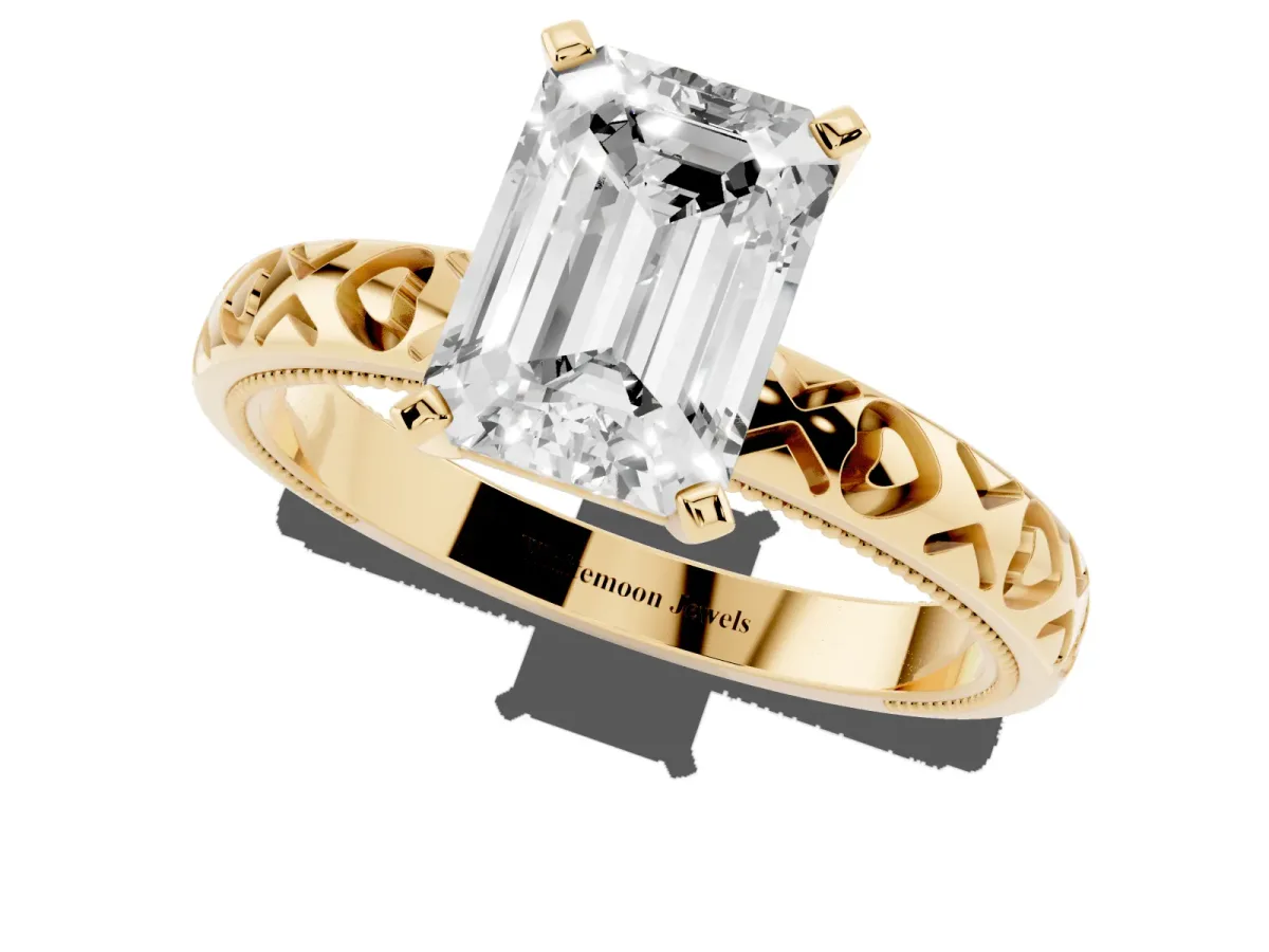 Emerald Cut Solitaire Diamond Engagement Ring with XO Engraved Band and Four-Prong Setting Yellow gold
