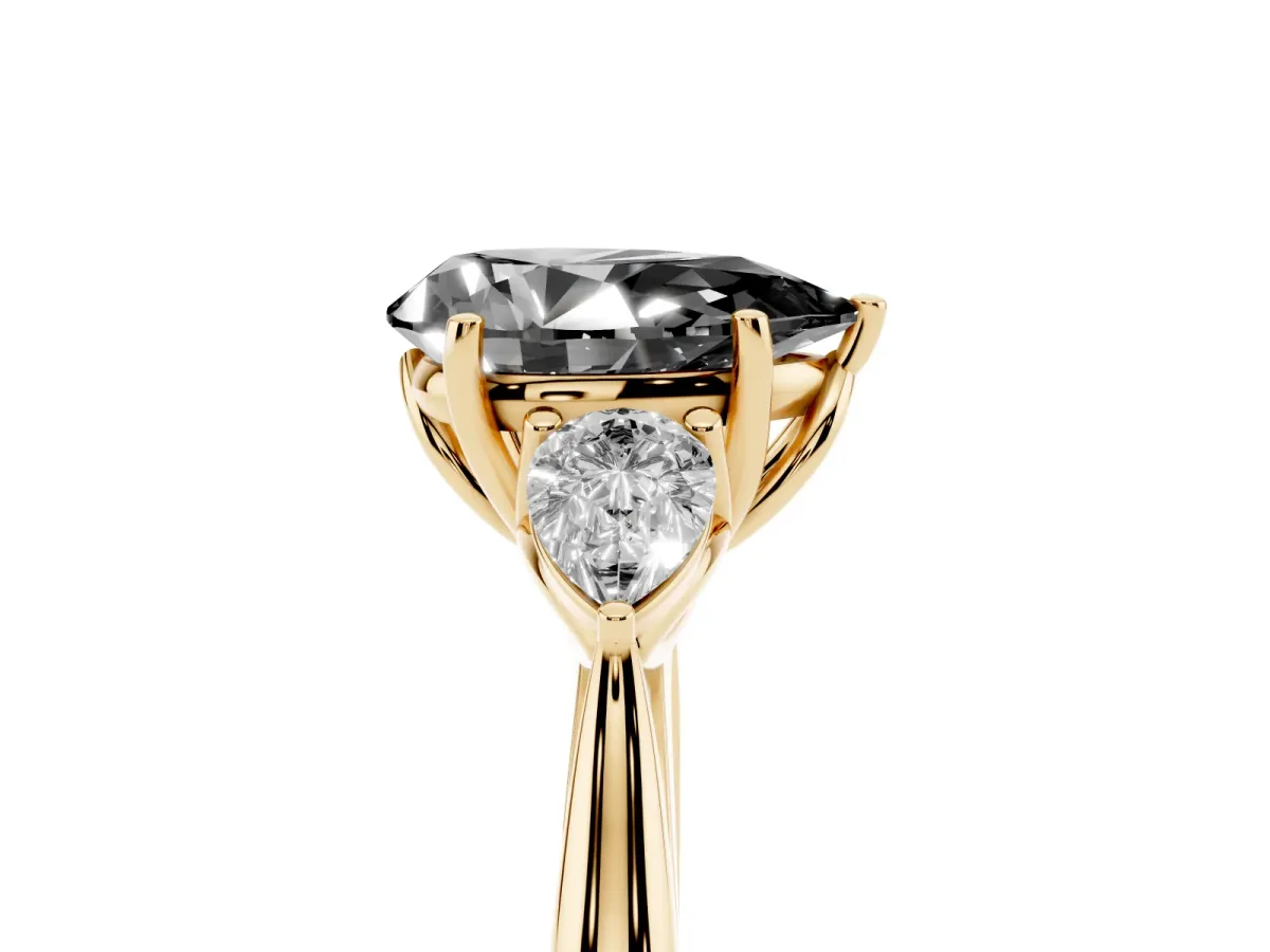 Fancy Black Pear Cut Diamond Three-Stone Ring with Pear Side Stones and Prong Setting Yellow gold