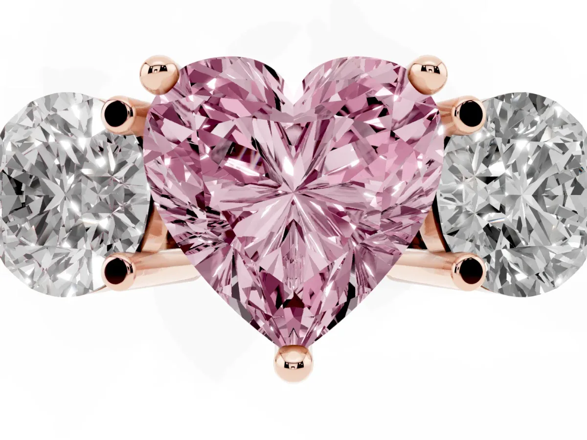 Fancy Pink Three-Stone Heart Cut Brilliant Cut Solitaire Ring with Prong Setting on a Classic Band Rose gold