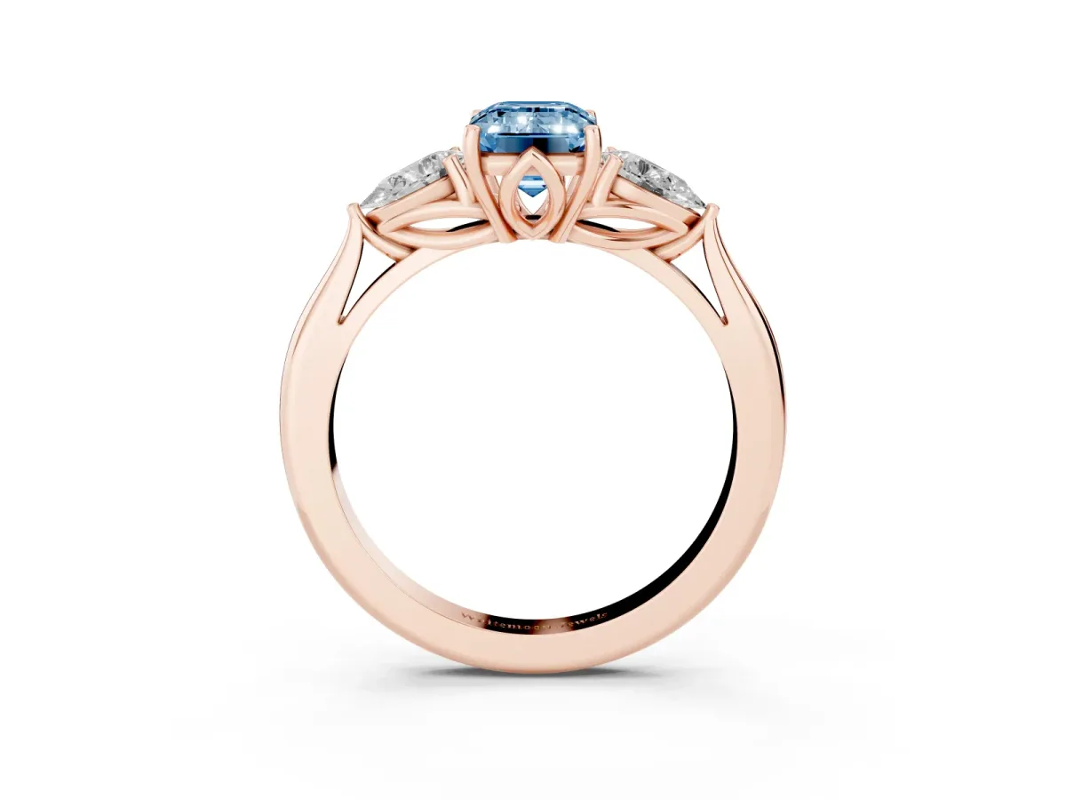 Fancy Blue Emerald Cut Diamond Three-Stone Ring with Pear Side Stones and Prong Setting Rose gold