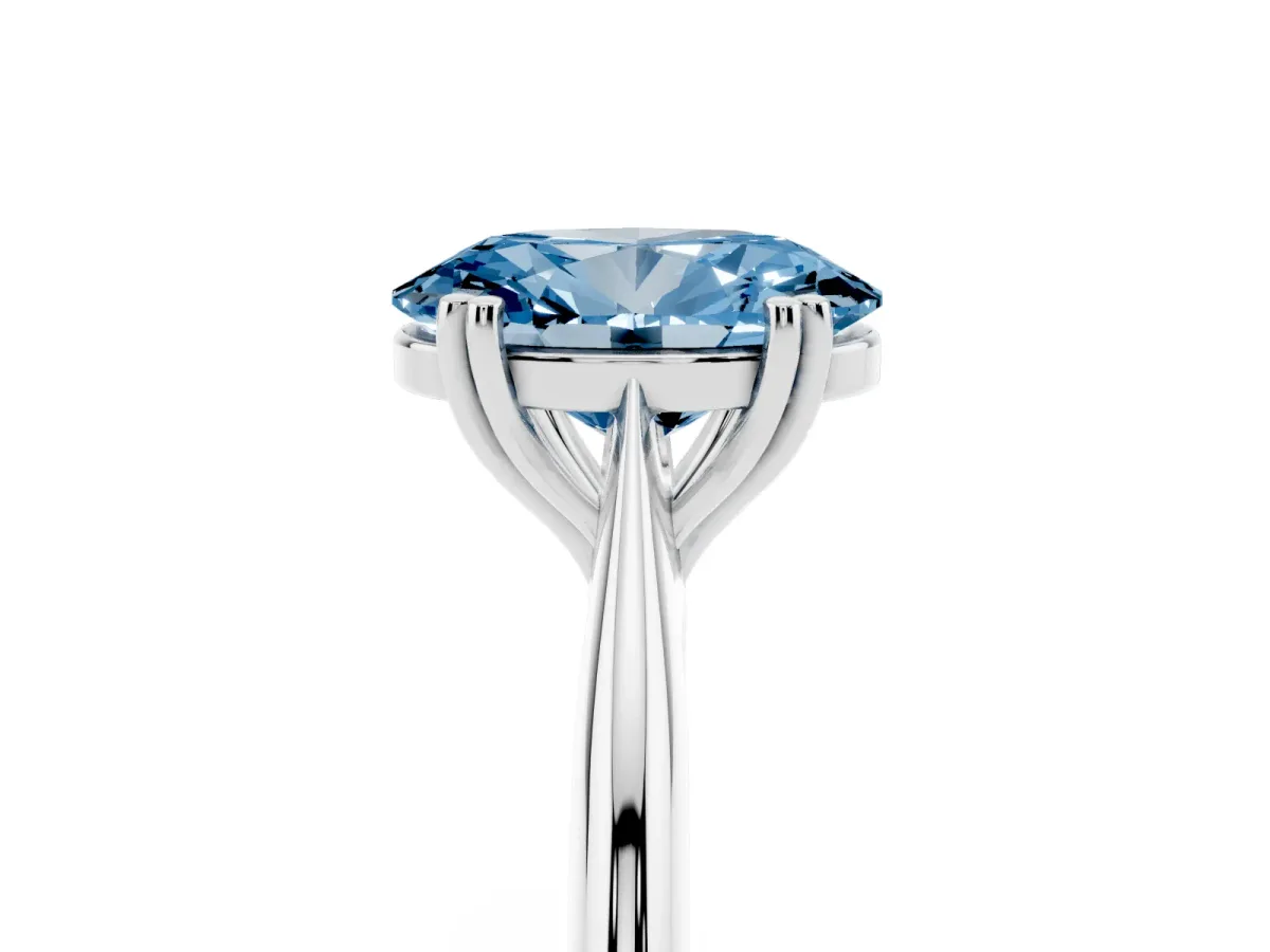 Fancy Blue Oval Cut Solitaire Diamond Ring with Six-Prong Setting and Classic Band Silver